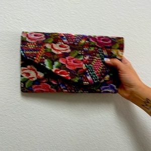 Tapestry clutch